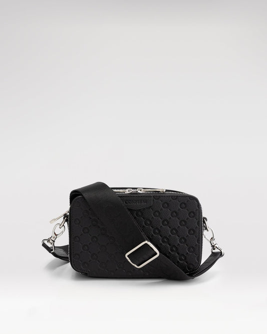 Confirm Mini Pouch made from 100% leather with spade details and a shoulder strap.