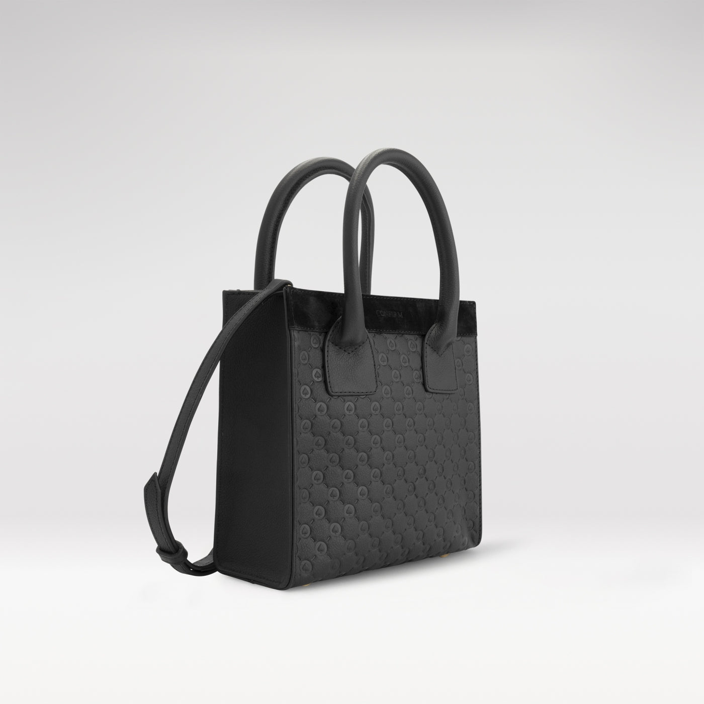 Confirm Mini Tote in zwart, 100% leer met ingestanst spade-patroon en goudkleurige details